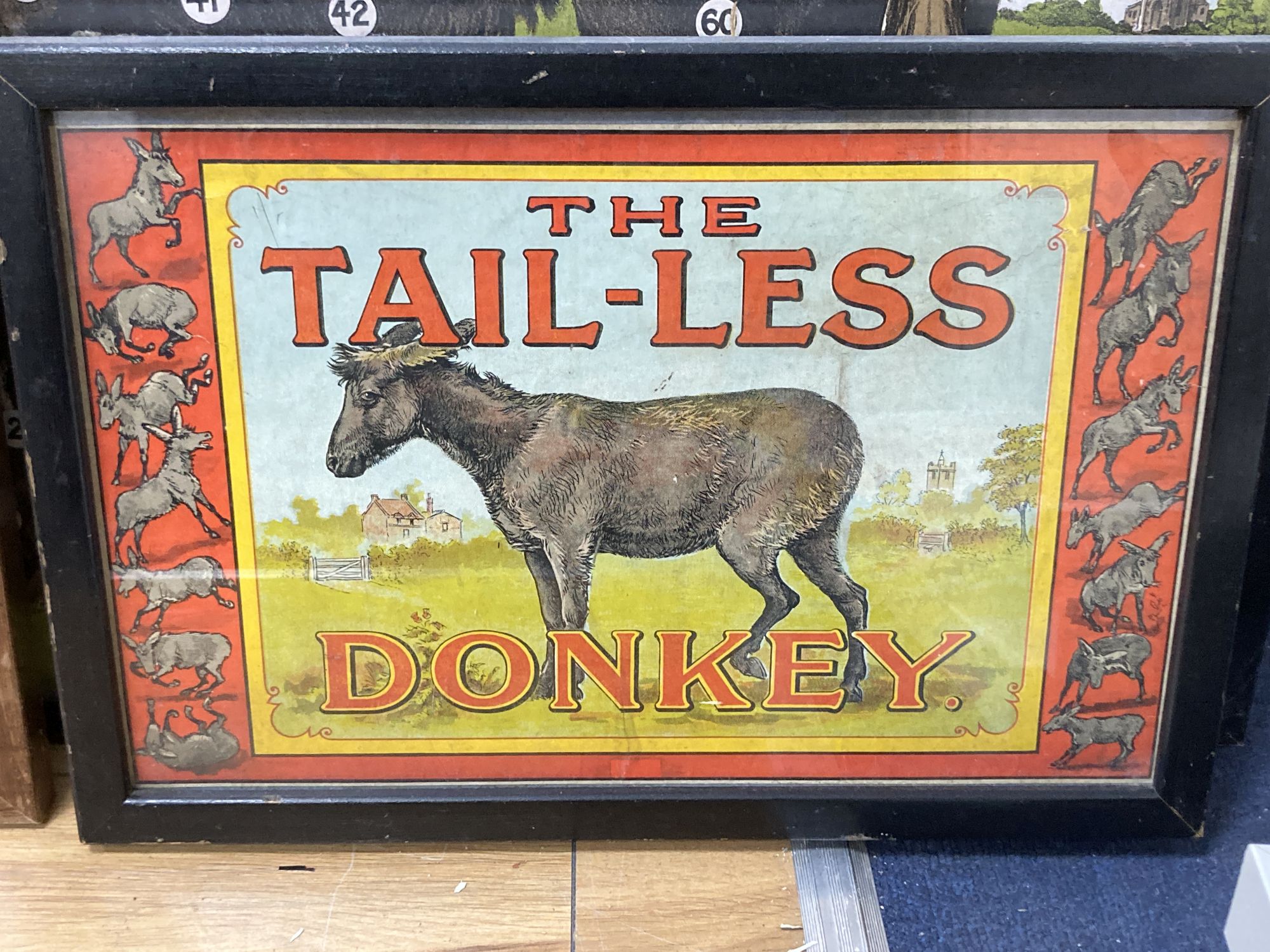 A group of Victorian and later chromolithographs and colour prints, including The tail-less donkey, 54 x 72cm and two jig-saw puzzles